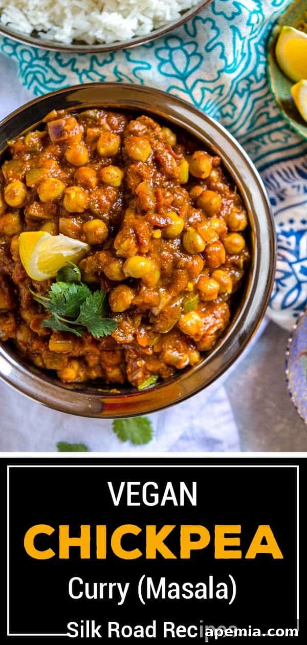 Large titled image: Vegan Chickpea Curry (Masala), showcasing a bowl of the curry with fresh ingredients in the background.