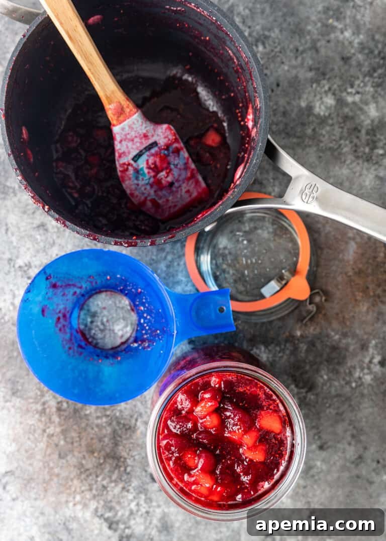 overhead: home canning fruit in mason jar, a method for preserving chutney