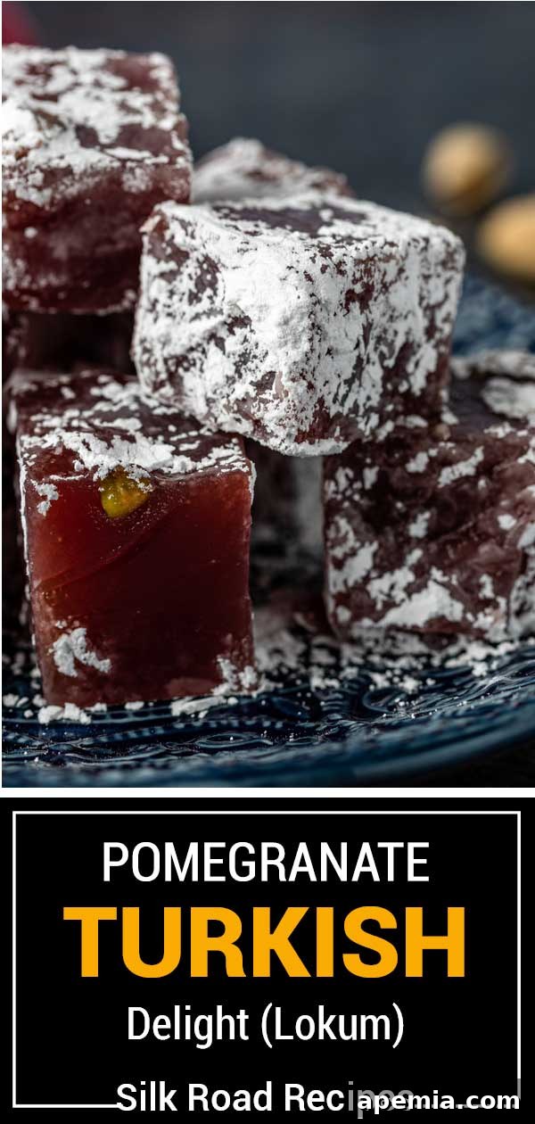 Titled image showing pomegranate Turkish Delight (Lokum) with pistachios, ideal for sharing.