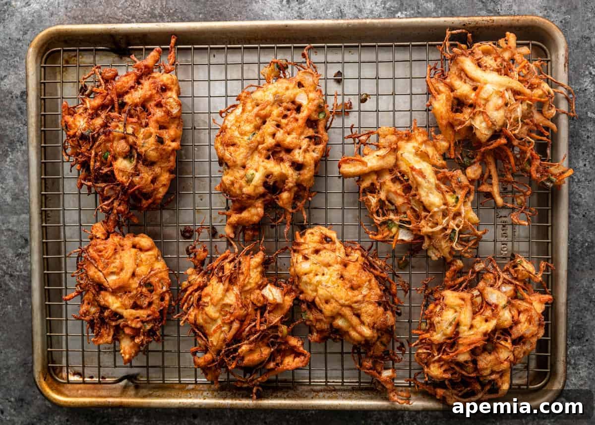overhead: fried egg foo young cooling on wire rack