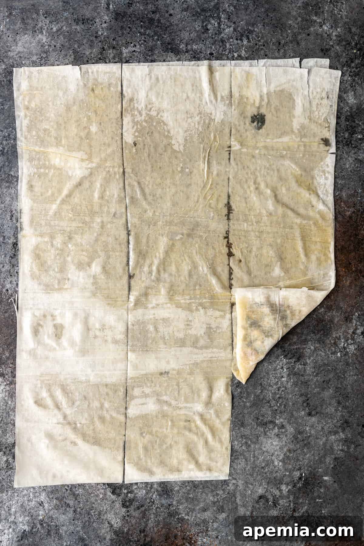 filling getting wrapped on buttered filo sheets