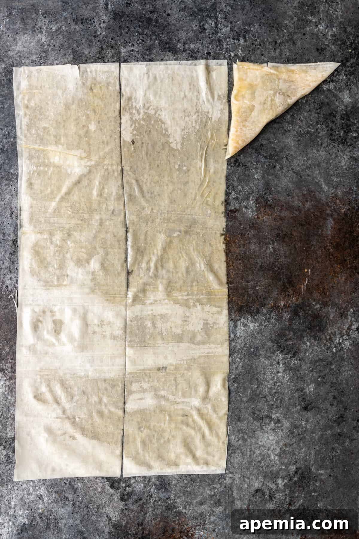 filling getting wrapped on buttered filo sheets