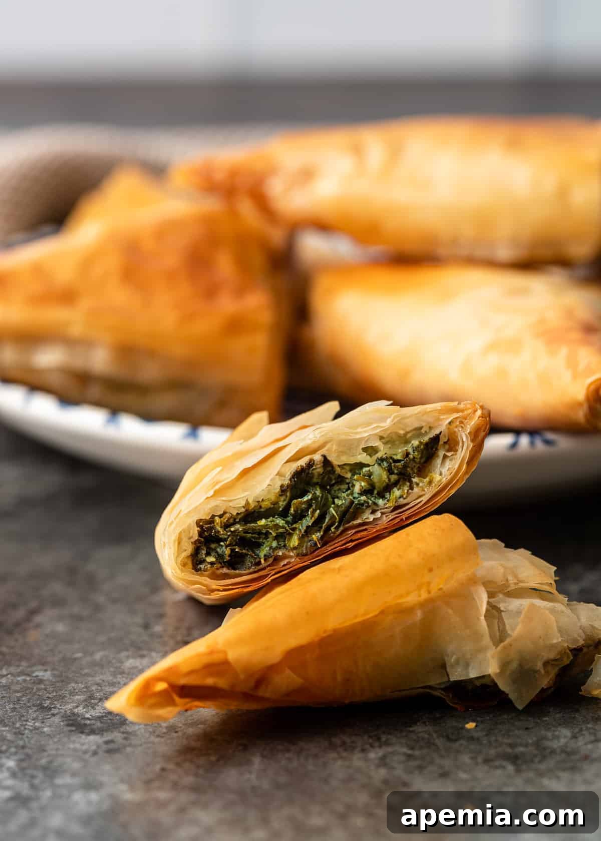 spinach filling inside spanakopita triangles recipe