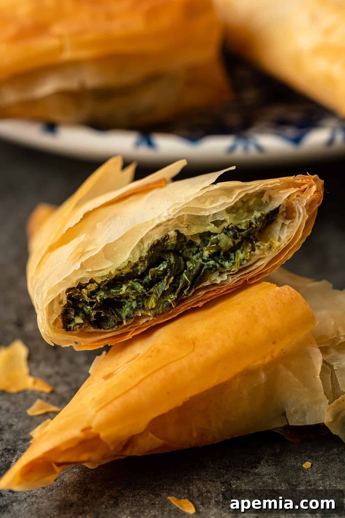 closeup: spanakopita triangles with flaky dough