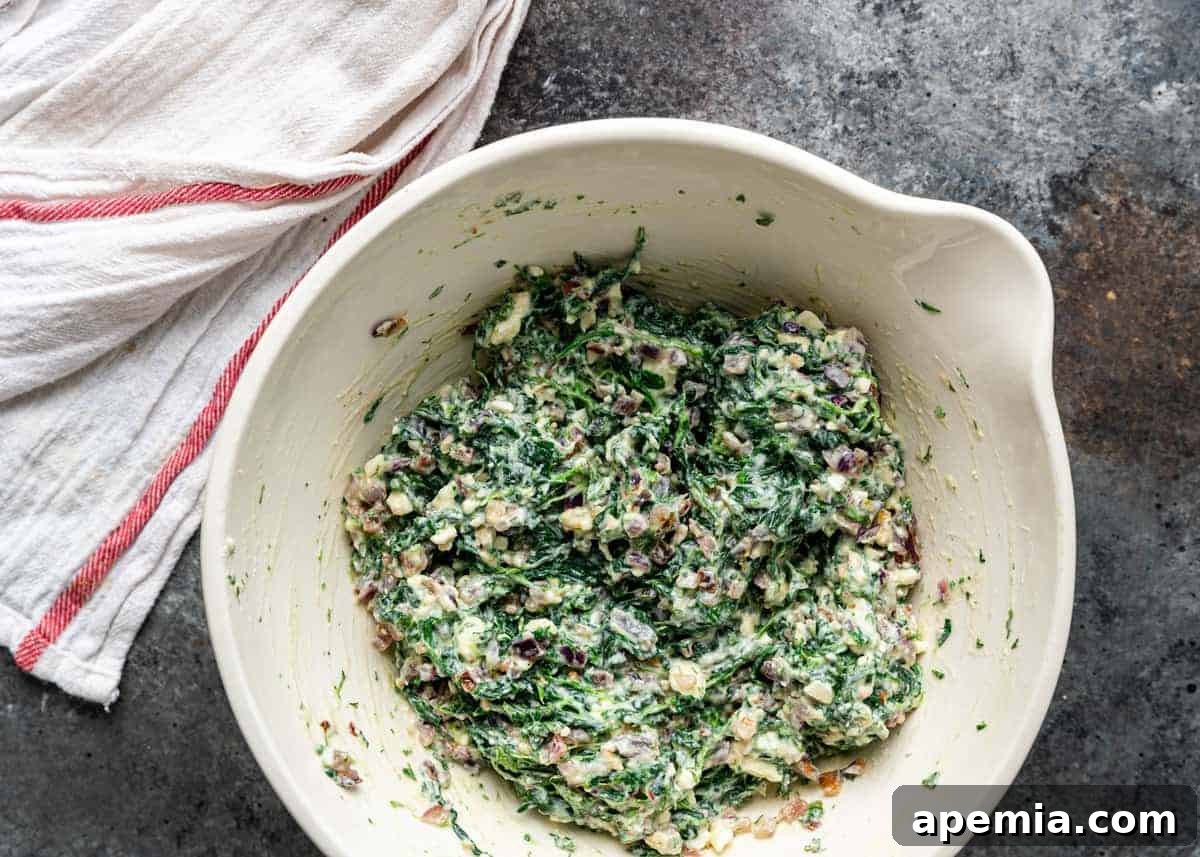 overhead: spanakopita triangles filling