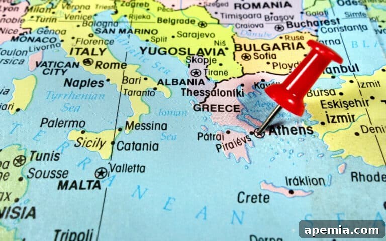 Red pin marking Athens on a map of Greece, highlighting the origin of Melomakarona
