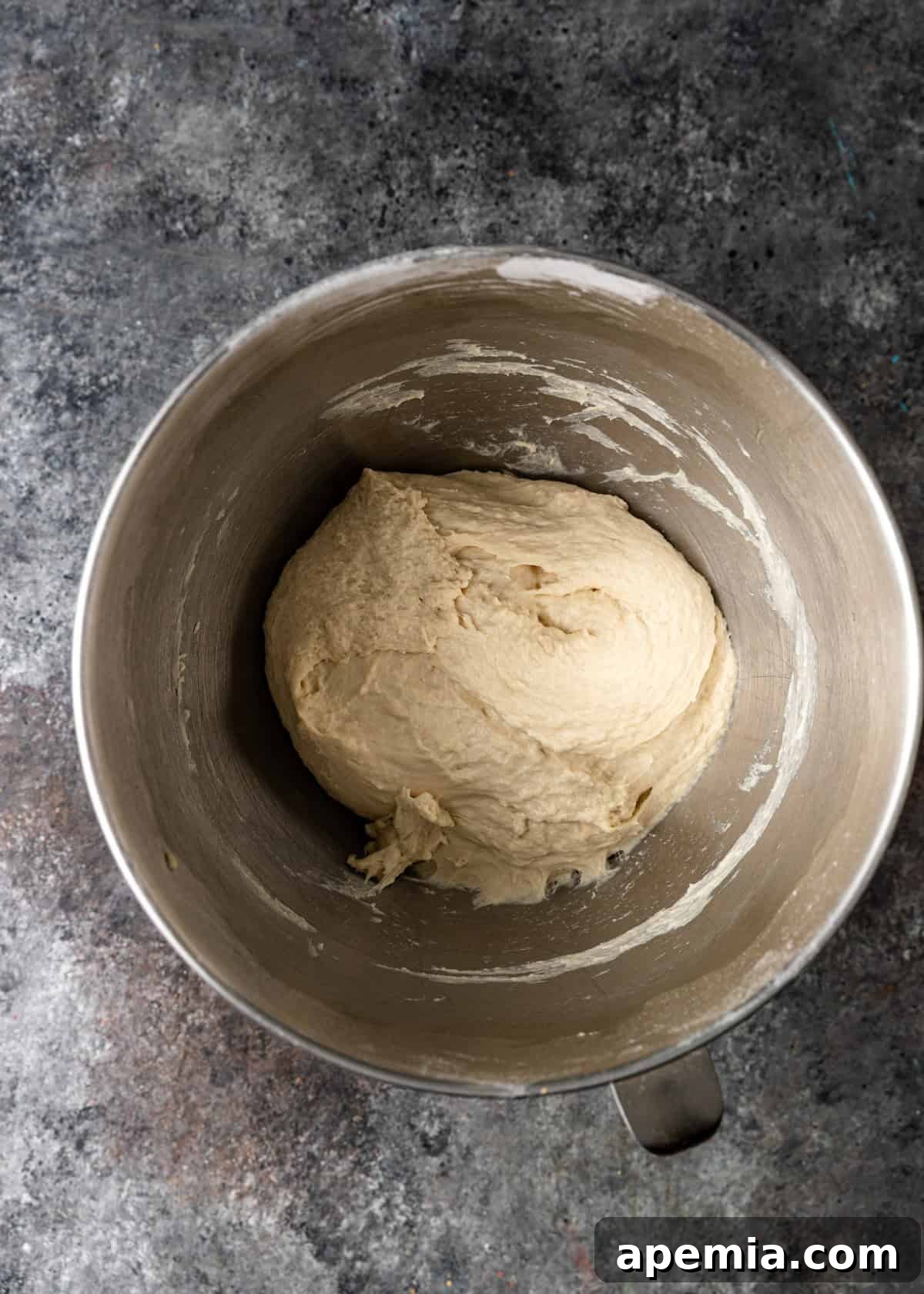 Classic Balkan Flatbread Lepinja 6 overhead process shot: mixed ingredients in mixing bowl