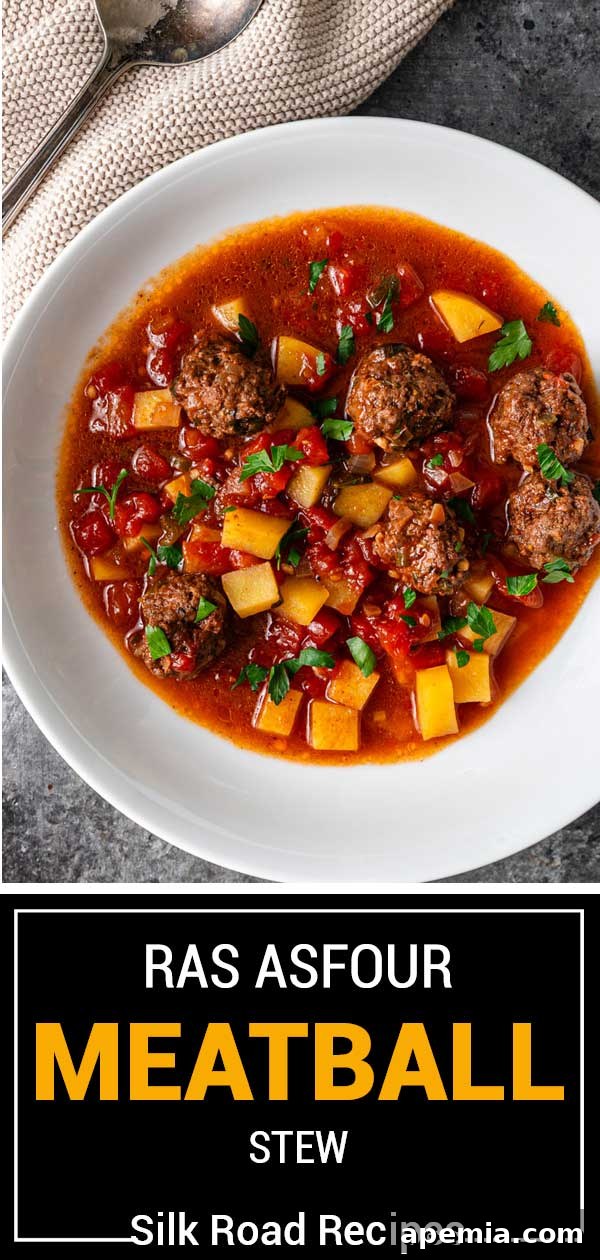 Titled image showing a bowl of Ras Asfour meatball stew, garnished and presented appealingly.