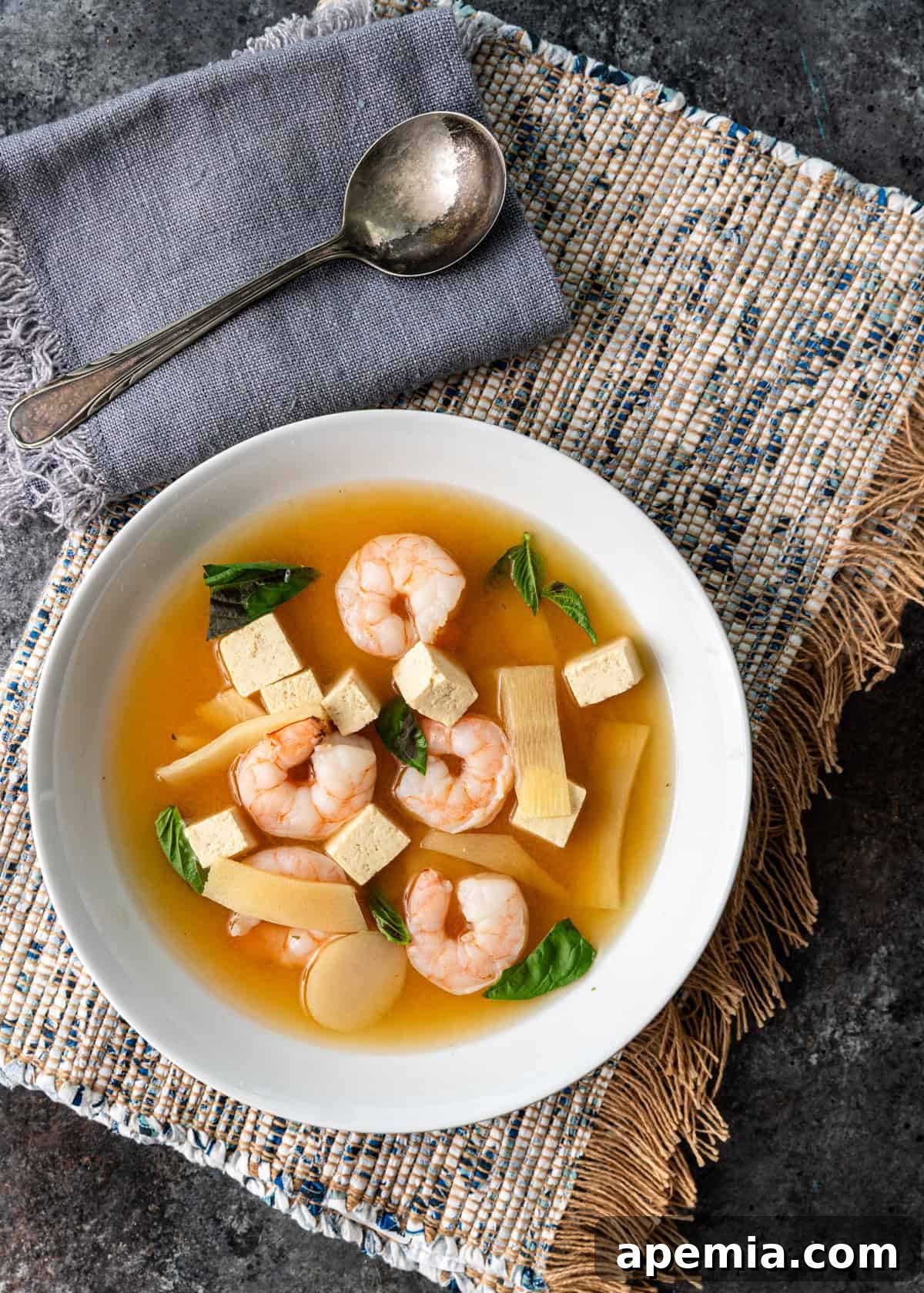 overhead: ready to serve bowl of lemon basil soup