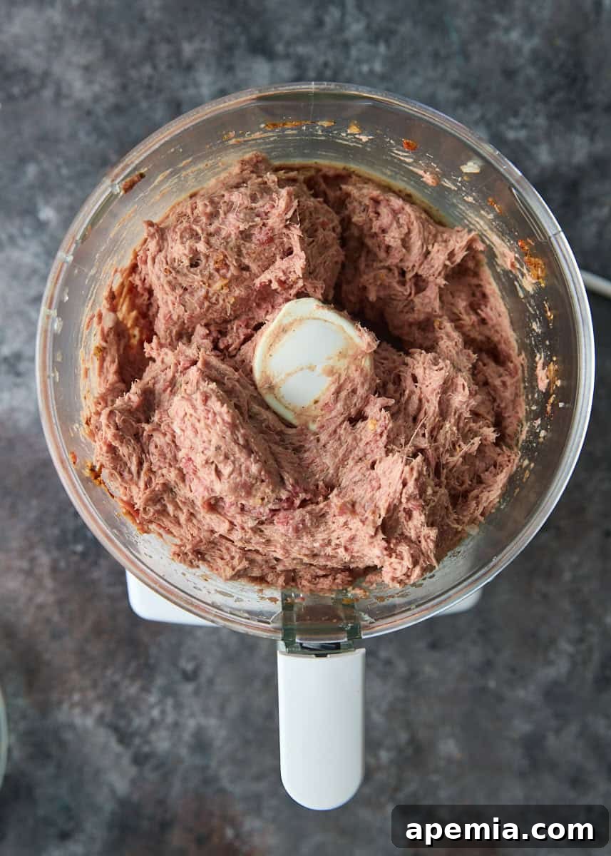 overhead process shot: meat in food processor