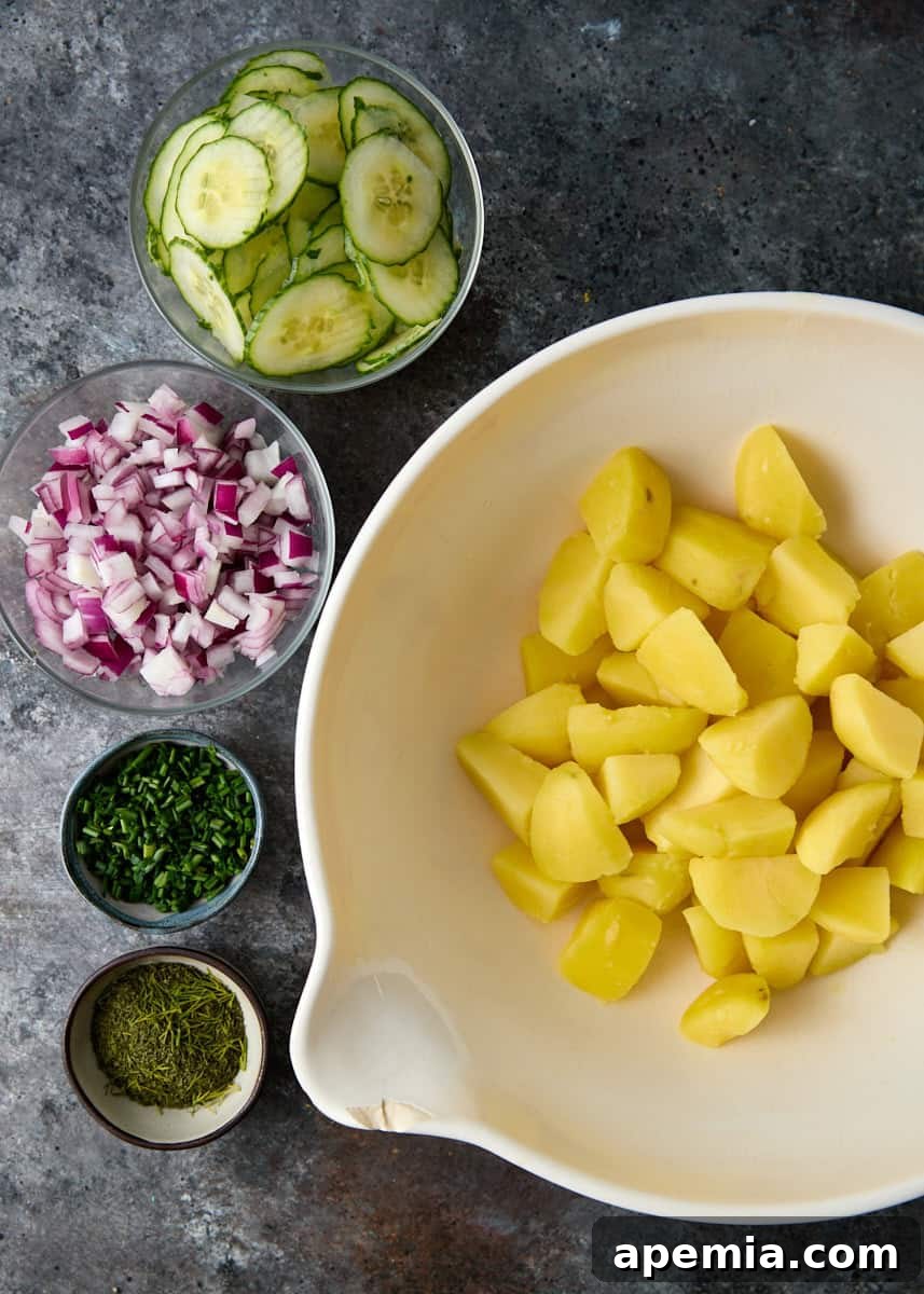 overhead process shot: ingredients for this potato cucumber salad 